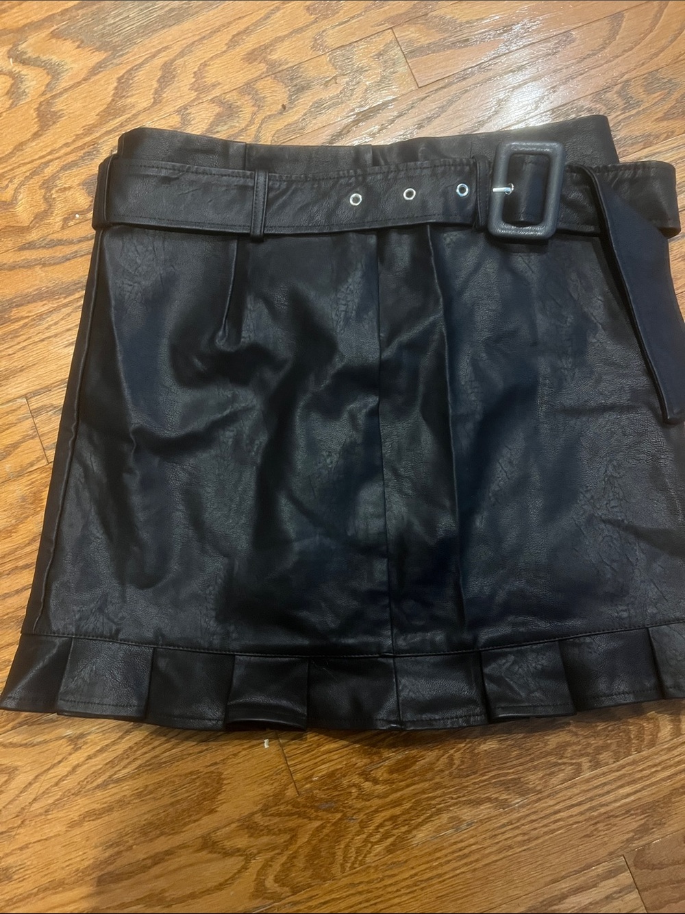 TCEC Black Faux Leather Mini Skirt with Belted Waist and Pleated Hem